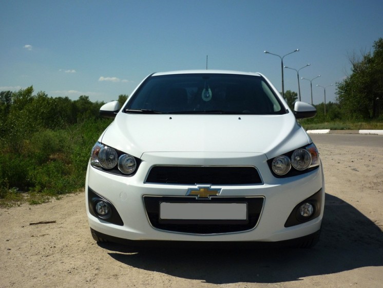 Фото Chevrolet Aveo II Sedan 1.6i (115Hp) (2012 г.в. 10000 км)