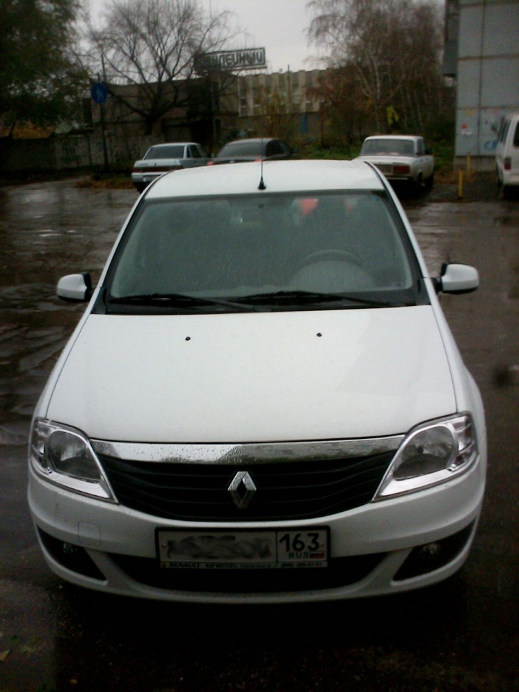 Фото Renault Logan (белый) (2012г.в. 10000 км)